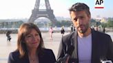 Paris Olympics organizers unveil a display of the five Olympic rings mounted on the Eiffel Tower