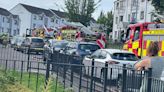 Pictured: Police shut down street over ongoing incident