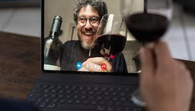 Laughter At Woman Visiting Home To Find Dad Joining Work Call—With Wine