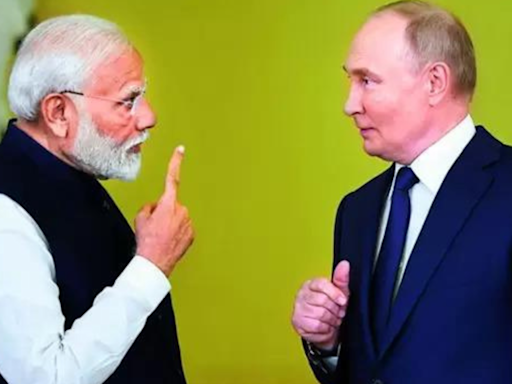 Heart bleeds when innocent kids die in war: PM Modi to Putin | India News - Times of India