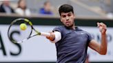 Swiatek roars into French Open semis as Alcaraz battles Tsitsipas