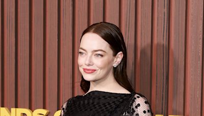 Emma Stone Has a Unique Take on the transparent Trend in a Vampy Net Gown