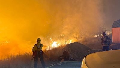 Oregon fire grows large enough to create its own weather as firefighters scramble to battle Western blazes