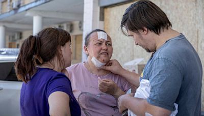 Ukraine mourns as rescuers search the rubble of a Kyiv children s hospital struck by a missile