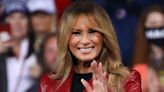 Melania Trump is radiant in red as she makes rare public appearance to support husband Donald Trump