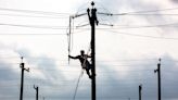 Utility poles set up at Cajun Field for upcoming annual Public Power Lineworkers Rodeo