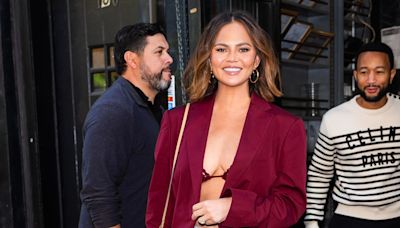 Chrissy Teigen Wore a Berry Crochet Bra as a Top in New York City