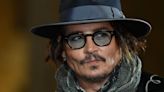 Johnny Depp Makes Surprise Appearance As Moon Person At MTV VMAs