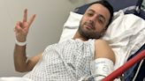 Pouria Zeraati: Iranian journalist shares defiant photo of himself from hospital bed after being stabbed in London