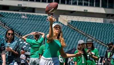 Inside the Eagles’ Women’s Football Festival, featuring Jalen Hurts, Mike Quick, and a whole lot of fans