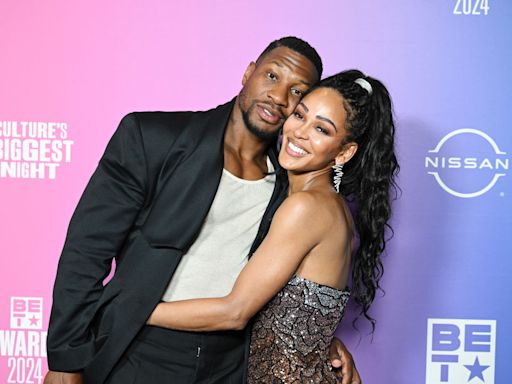 Captain Save-A-Kang? Rumor Alleges Meagan Good Coretta Covers Jonathan Majors' Bills & Child Support, Insiders & Social Media...