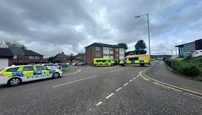 Armed police cordon off flat as they deal with incident