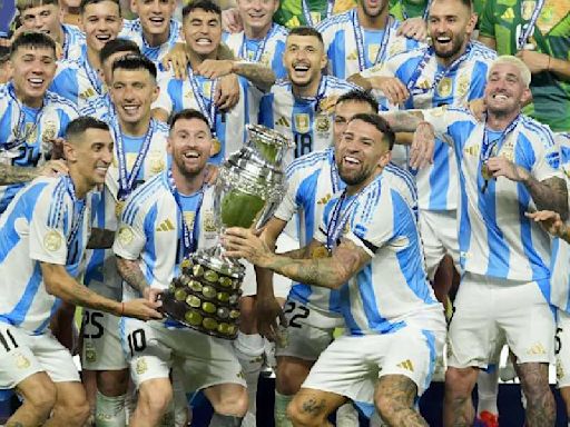 Martinez steps in with winner after injured Messi limps out: Champions Argentina raise the bar with hat-trick of titles