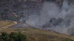 Firefighters battle brush fire that’s threatening structures in Lake County