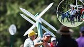 Bryson DeChambeau seen wildly walking at Masters carrying Augusta signpost