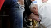 Pope, looking well, visits female prison for foot-washing ritual