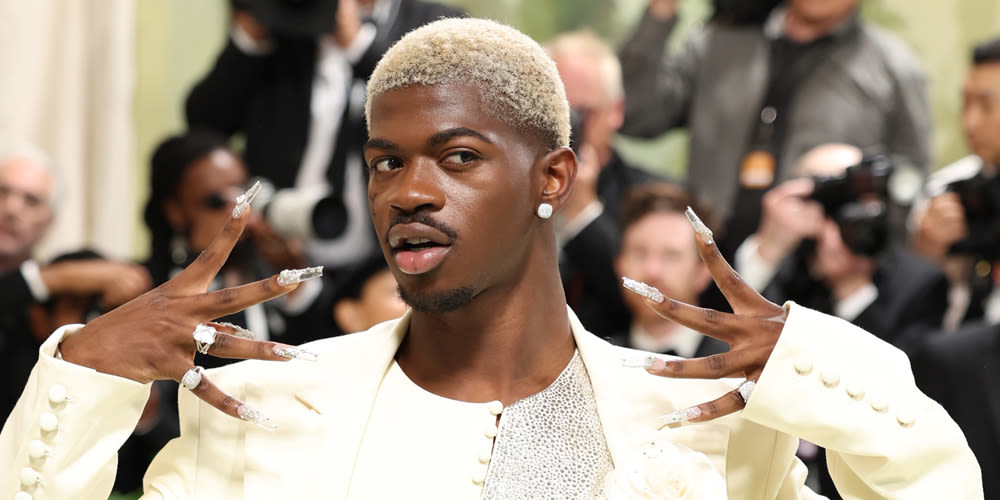 Lil Nas X Puts Modern Spin on Three-Piece Suit, Debuts Platinum Hair at Met Gala 2024