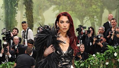 Dua Lipa Dominates the 2024 Met Gala Red Carpet in All-Black Ensemble