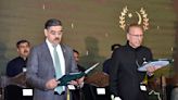 Pakistan's caretaker prime minister sworn in as people celebrate Independence Day