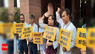 Aam Aadmi Party (AAP) MPs protest Delhi CM Arvind Kejriwal's arrest, boycott president's address in parliament | Delhi News - Times of India