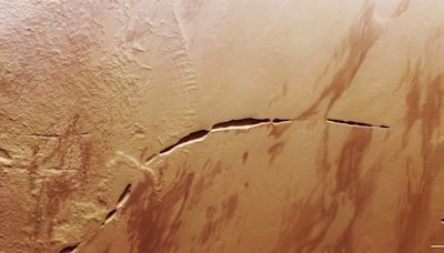 Satellite Photo Reveals Grand Canyon-Sized Scar on the Surface of Mars