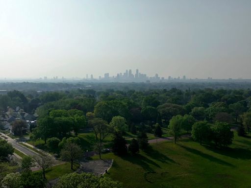 Smoky skies return to at least six US states as Canada wildfires rage and 21 million face air quality warnings