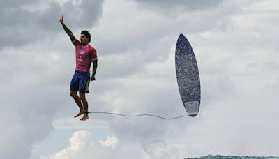 2024 Olympics: Brazilian surfer Gabriel Medina appears to defy gravity in spectacular photo of record-setting ride