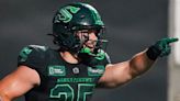 Roughriders' fullback Clint Ratkovich celebrates first CFL touchdown