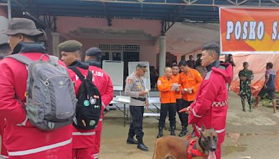 Search intensifies for dozens buried in Indonesia landslide that killed 23