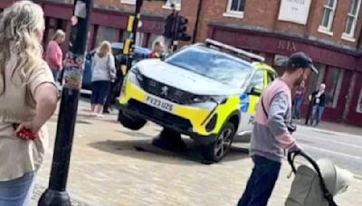 You can't park there! Police car jammed on bollard after wrong turn