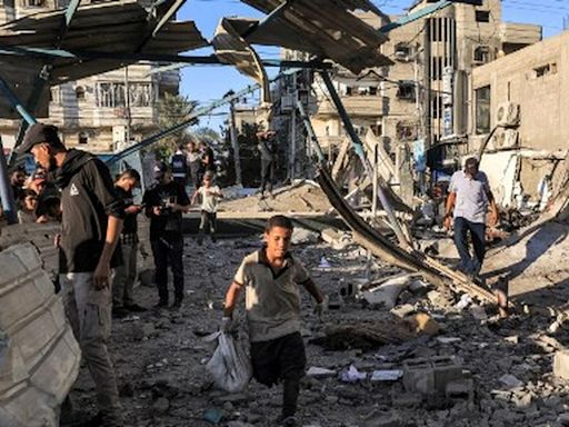 Israeli strike kills 16 at UN-run school in Gaza as ceasefire talks continue