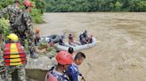 Two buses carrying at least 60 people swept into a river by a landslide in Nepal, three survivors found