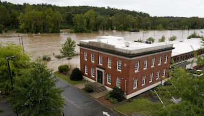 Torrential rains flood North Carolina mountains and create risk of dam failure