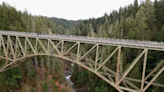 Man falls 400ft into canyon beneath bridge and lives