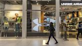 Under Armour to Restructure Business, Warns of Revenue Drop