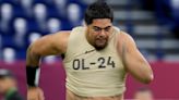 Saints sign first round pick, massive offensive tackle whose job it is to protect Derek Carr