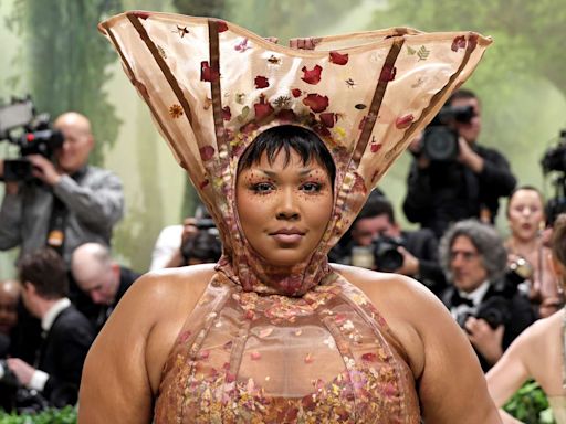 Lizzo Hits the 2024 Met Gala One Month After Announcing She's Quitting 'Negative Energy'