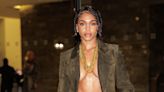 Lori Harvey Looks Ethereal in a Sheer, Plunging Blouse and Layered Gold Necklaces