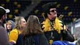 Hawkeye Elvis rocks Iowa games, pays homage to his mother's love for the King