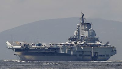 China flexes muscles with aircraft carrier near US ally