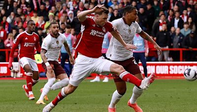 Manchester City keep pressure on Arsenal with 2-0 win over Forest