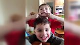 Firefighters say 6-year-old was protecting his 3-year-old brother when they died in house fire