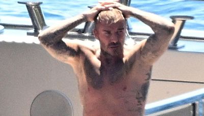 David Beckham gives himself a good hose down in his tighty whities on a yacht