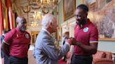 King Charles learns new handshake and fist bumps West Indies cricket players | ITV News