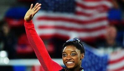 Simone Biles has calf discomfort at Olympic qualifiers but keeps competing