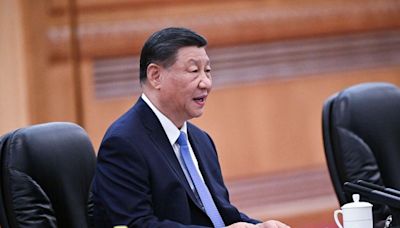 China's Xi calls for 'bridges' amid trade, diplomatic frictions