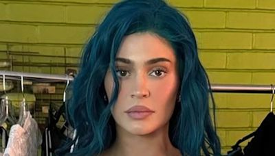 Blue-haired Kylie Jenner flashes abs in a tiny white tank top