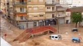 Man and woman rescued from cars as floods hit Spain