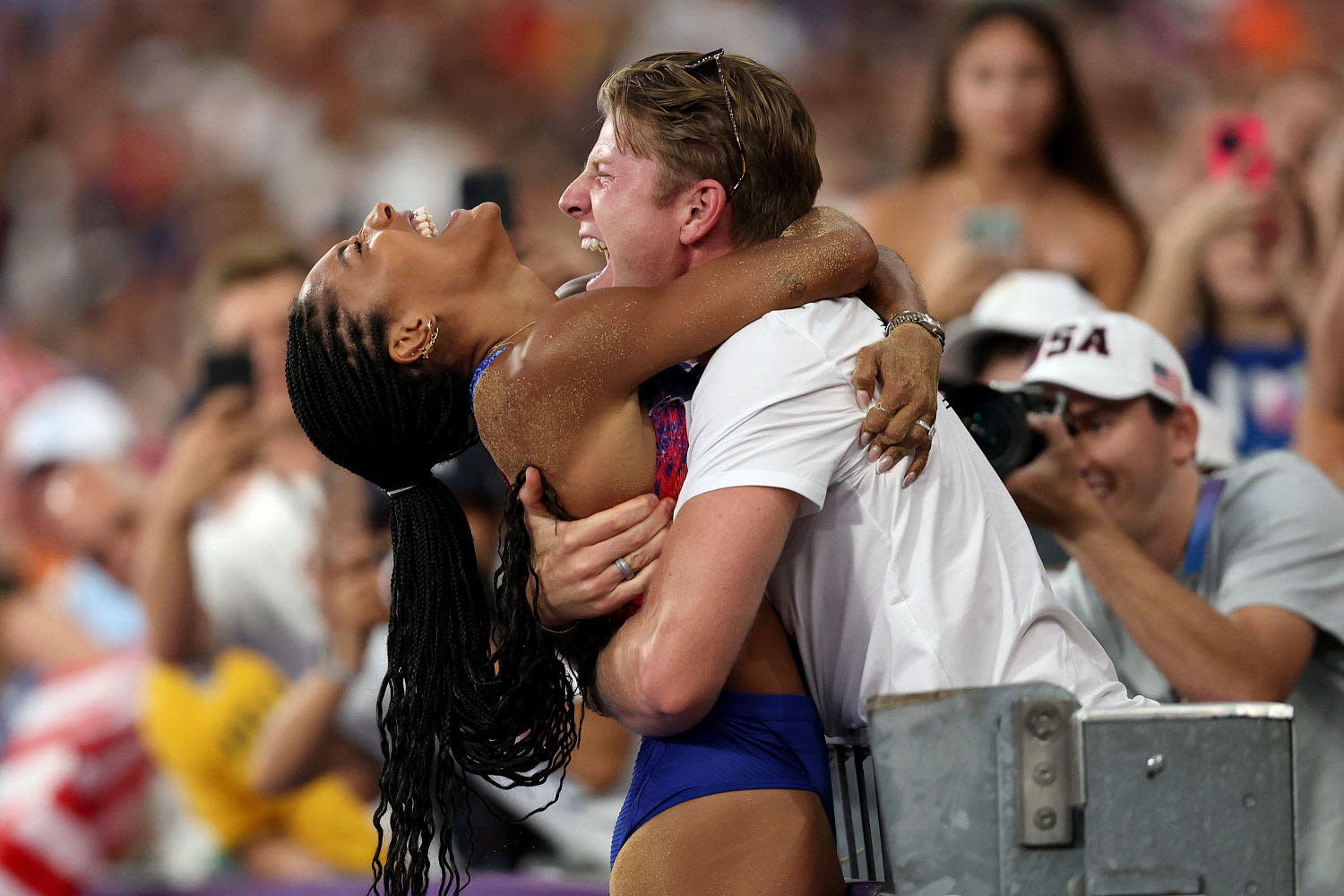 Tara Davis-Woodhall recalls running to husband Hunter after winning gold: 'It felt so good'