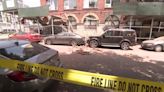 Surveillance video shows dust filling street as Brooklyn building partially collapses